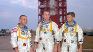 Grissom, White, and Chaffee in front of the launch pad.